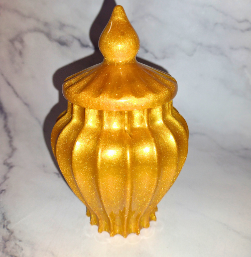 Luxury handmade resin jar with lid featuring sculpted design and glossy decorative finish